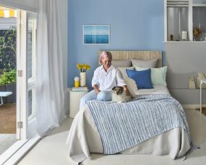 Feature wall painted in Resene Dream Big, headboard in Resene Colorwood Whitewash, other wall in...