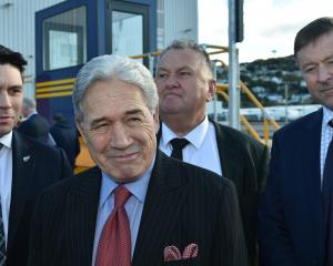 Winston Peters (front) surrounded by other ministers at the opening of the new Hillside workshops...